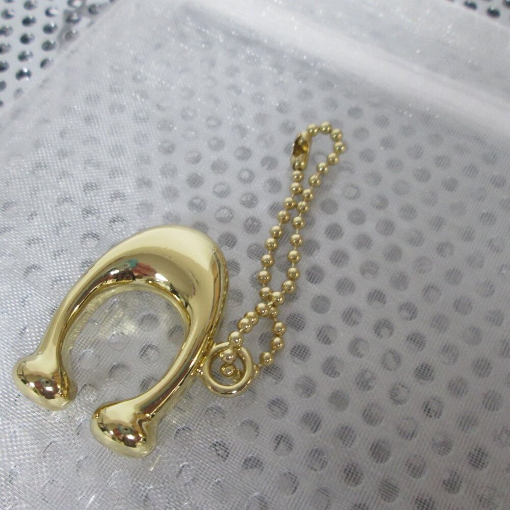 Coach charm Gold colored Horseshoe style collectors